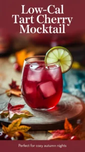 Low-calorie tart cherry mocktails in stemless glass with lime garnish, perfect for autumn