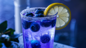 Blueberry Lemon Fizz mocktail with fresh blueberries and lemon garnish