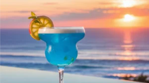 Ocean Breeze Mocktail with layered blue hues and citrus garnish