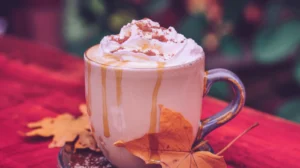 Creamy vanilla maple latte with whipped cream and cinnamon